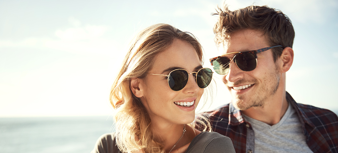 Young Couple Wearing Sunglasses